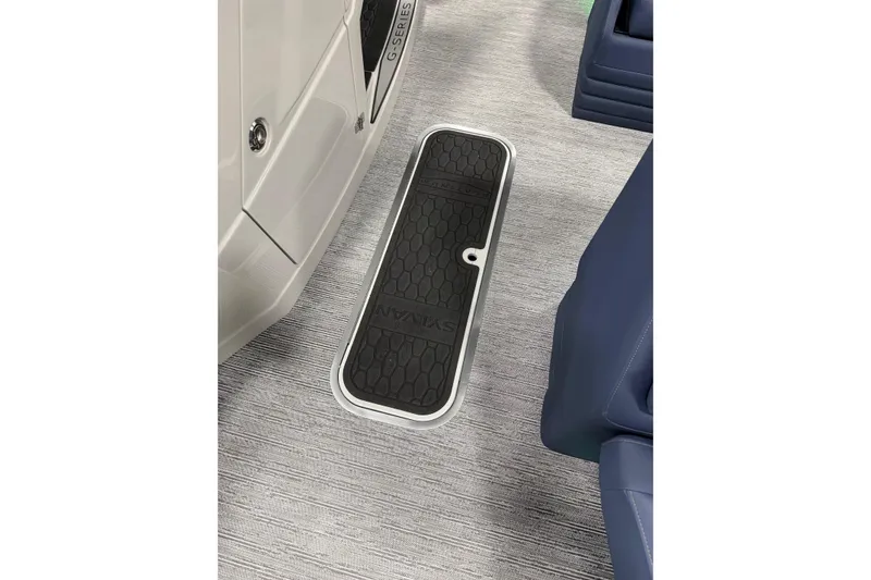 Slide: The Image of 2025 Sylvan G3 SLZ boat interior with sleek flooring and storage compartment. - 7