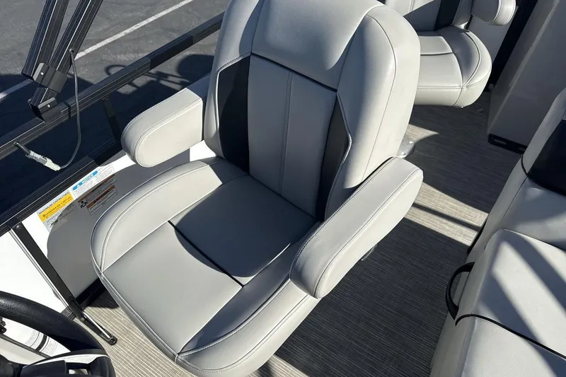 Slide: The Image of 2023 Viaggio Del Mar 18F boat seat with gray upholstery and armrests. - 13