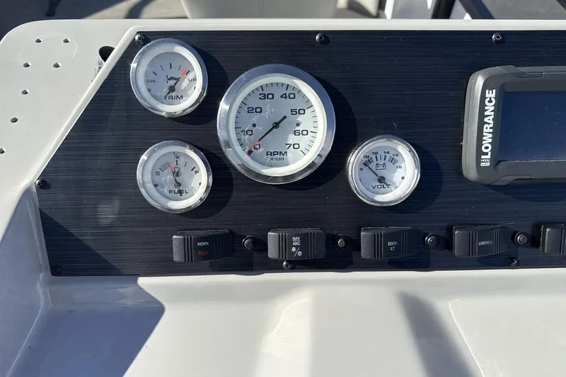 Slide: The Image of 2023 Viaggio Del Mar 18F dashboard with gauges and Lowrance display. - 15