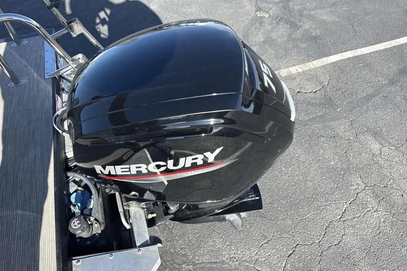 Slide: The Image of 2023 Viaggio Del Mar 18F with Mercury outboard motor in parking lot. - 20