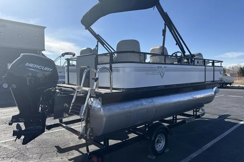 Slide: The Image of 2023 Viaggio Del Mar 18F pontoon boat with Mercury engine on trailer. - 5