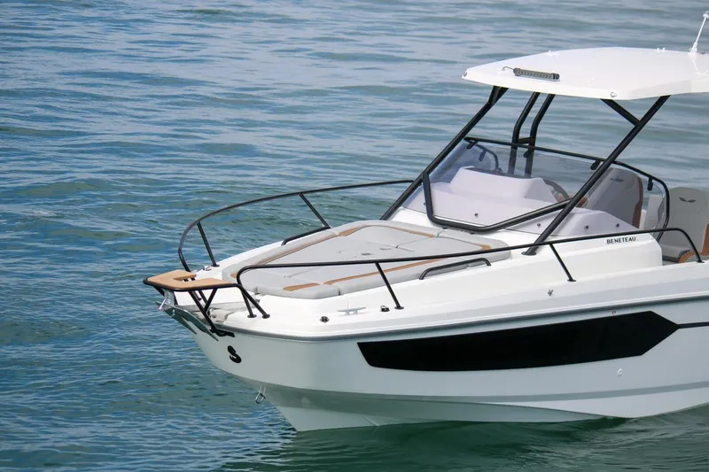 Slide: The Image of 2026 Beneteau Flyer 8 SUNdeck boat on calm water, showcasing sleek design. - 10