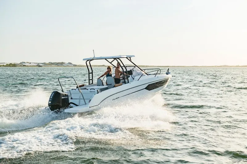 Slide: The Image of 2026 Beneteau Flyer 8 SUNdeck cruising on open water, showcasing sleek design and performance. - 14
