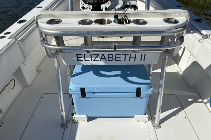 Slide: The Image of 2001 Contender 31 Open boat interior with "Elizabeth II" nameplate and blue Engel cooler. - 11