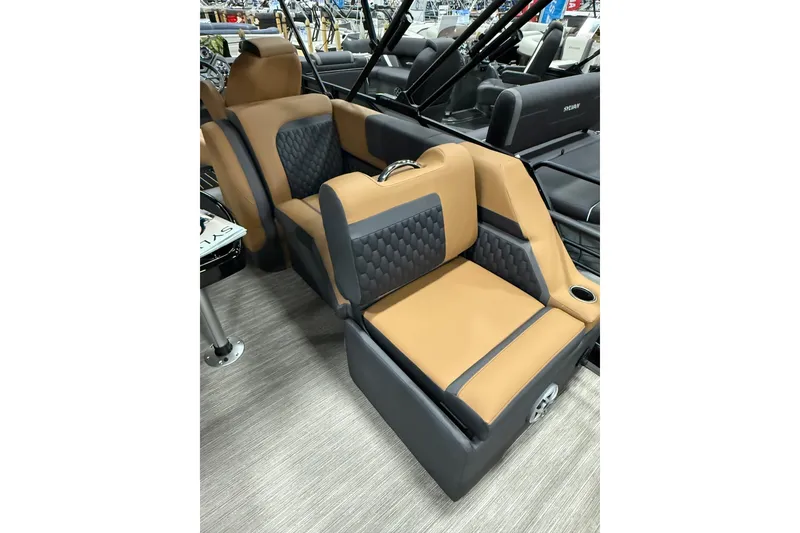 Slide: The Image of Luxurious seating in 2026 Sylvan L3 LZ DH boat, featuring tan and black upholstery. - 12