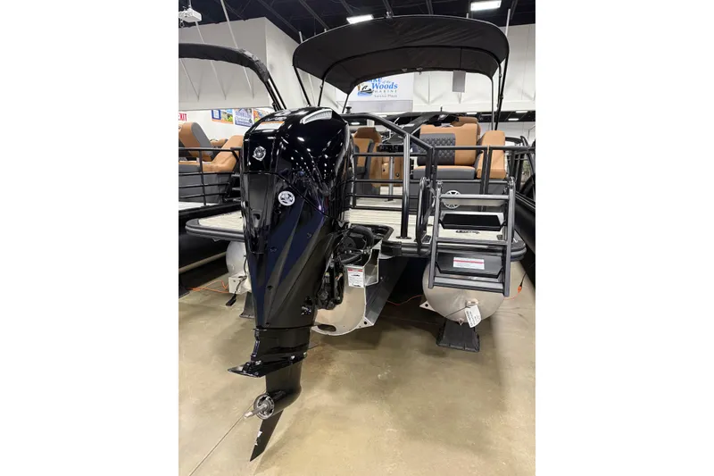 Slide: The Image of 2026 Sylvan L3 LZ DH pontoon boat with powerful outboard motor. - 14