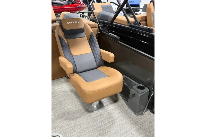Slide: The Image of Luxurious Sylvan L3 LZ DH 2026 boat seat with tan and gray upholstery. - 6