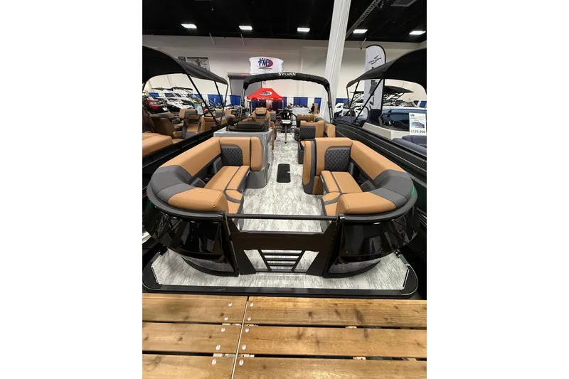 The Image of 2026 Sylvan L3 SLZ pontoon boat with luxurious seating and modern design. - 0