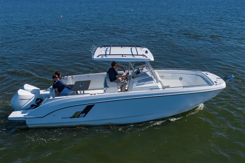 Slide: The Image of Manufacturer Provided Image: 2026 Beneteau Flyer 9 SPACEdeck cruising on open water, side view. - 3