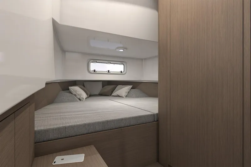 Slide: The Image of Manufacturer Provided Image: 2026 Beneteau Flyer 9 SPACEdeck cabin interior with cozy bedding and modern design. - 6