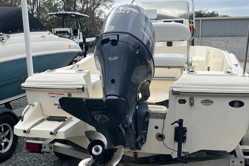 Slide: The Image of 2019 Scout 175 Sportfish boat with Yamaha outboard motor on trailer. - 11