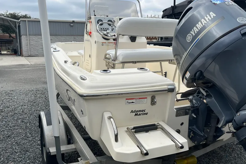 Slide: The Image of 2019 Scout 175 Sportfish boat with Yamaha engine on trailer. - 9
