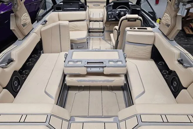 Slide: The Image of Luxurious interior of 2026 Supra SL boat with beige seating and modern design. - 15