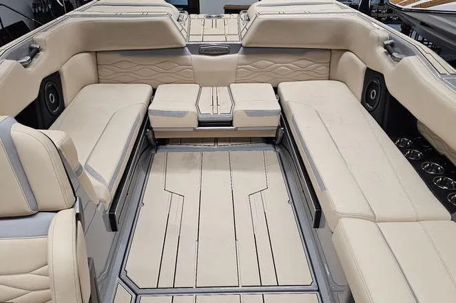 Slide: The Image of Luxurious interior of a 2026 Supra SL boat with beige seating and modern design. - 16