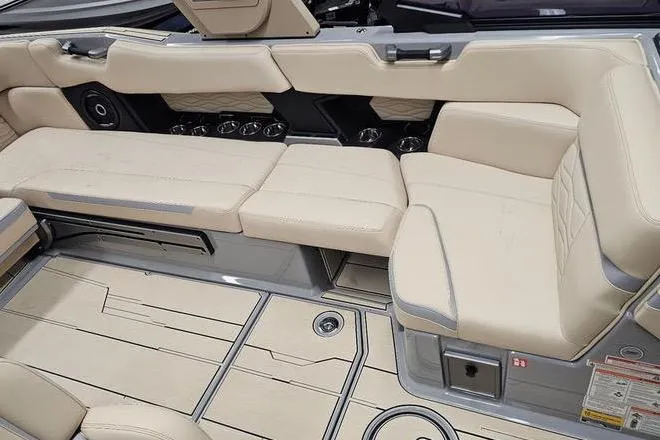 Slide: The Image of Luxurious interior of 2026 Supra SL boat with beige seating and modern design. - 17