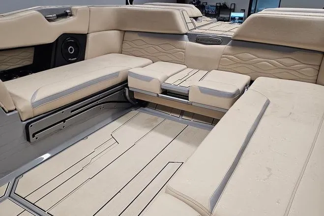 Slide: The Image of Luxurious interior seating of 2026 Supra SL boat with beige upholstery and modern design. - 18