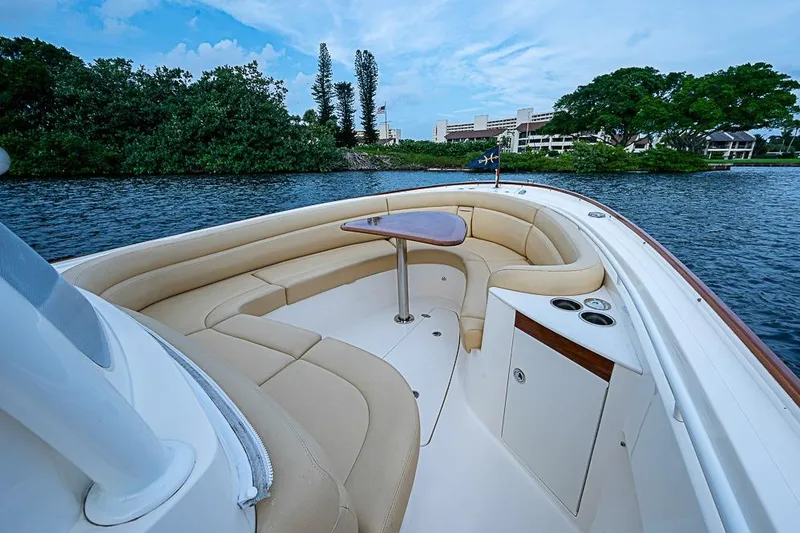 Slide: The Image of 2018 Hunt Yachts 32 Center Console with elegant seating and scenic water view. - 13