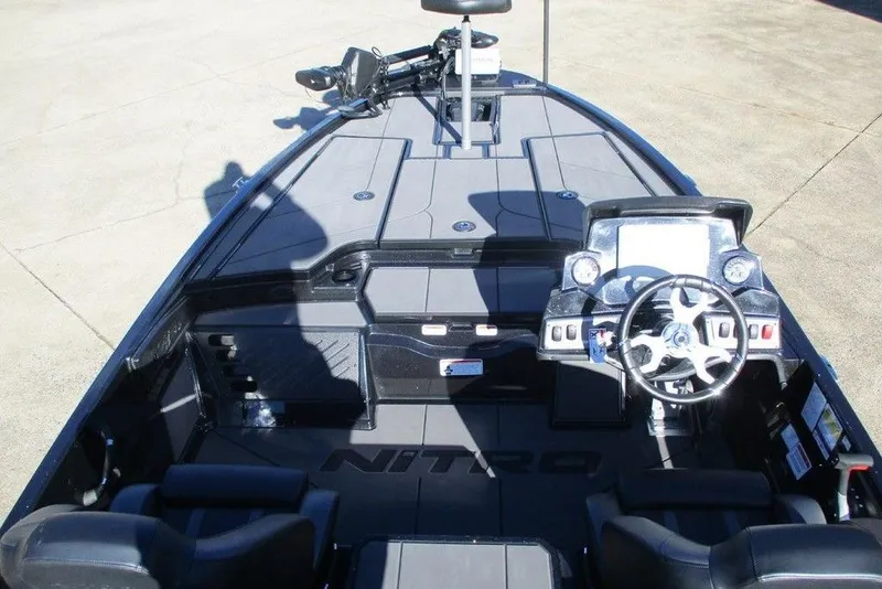 Slide: The Image of 2026 Nitro Z19 XL Pro boat interior with steering wheel and control panel. - 8