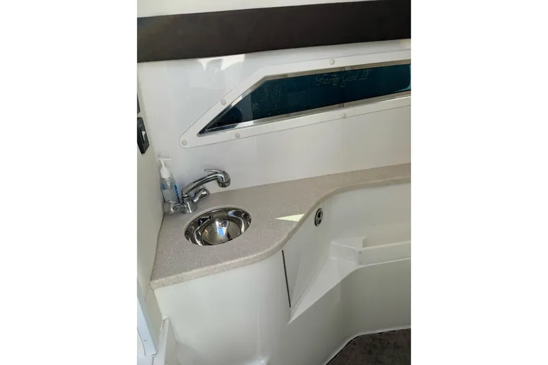 Slide: The Image of 2013 Cobalt 336 boat interior with sink and countertop. - 14
