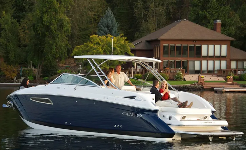 Slide: The Image of Manufacturer Provided Image: 2013 Cobalt 336 boat cruising on a lake with people relaxing onboard. - 19