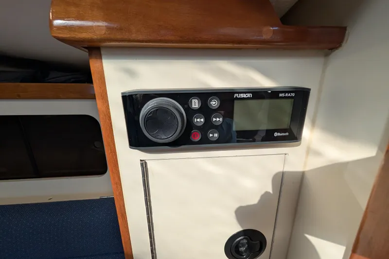Slide: The Image of Fusion MS-RA70 stereo system in 2004 Albin 30 Family Cruiser interior. - 11