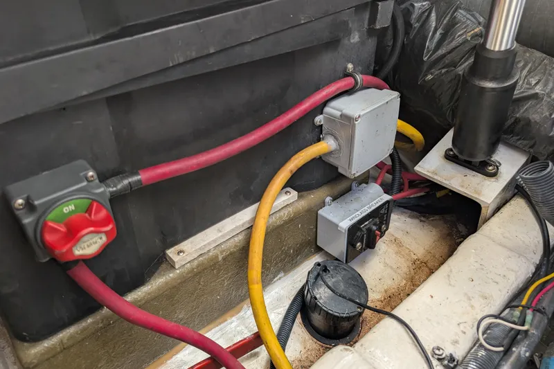 Slide: The Image of Electrical components in a 2004 Albin 30 Family Cruiser boat engine compartment. - 52