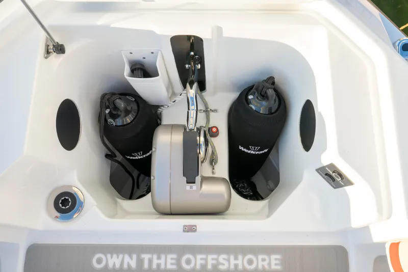 Slide: The Image of 2026 Wellcraft 28 T-Top boat storage area with equipment and accessories. - 29