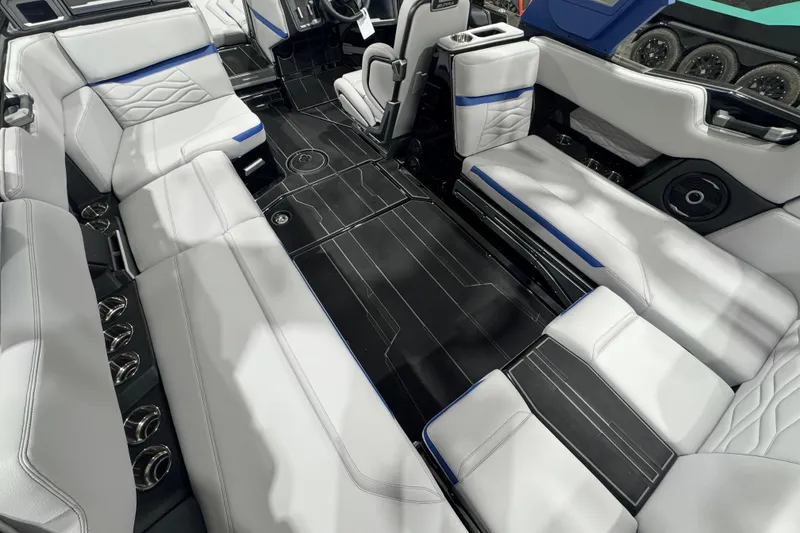 Slide: The Image of 2026 Supra SL interior with luxurious white seating and modern design elements. - 10