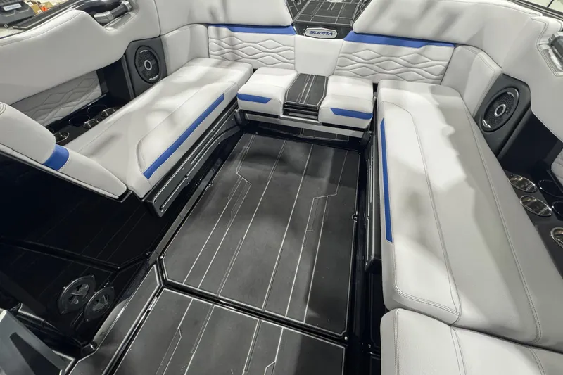 Slide: The Image of 2026 Supra SL boat interior with luxurious seating and modern design. - 12