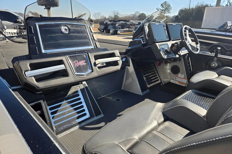 Slide: The Image of 2022 Ranger Z520R boat interior with modern dashboard and steering wheel. - 26