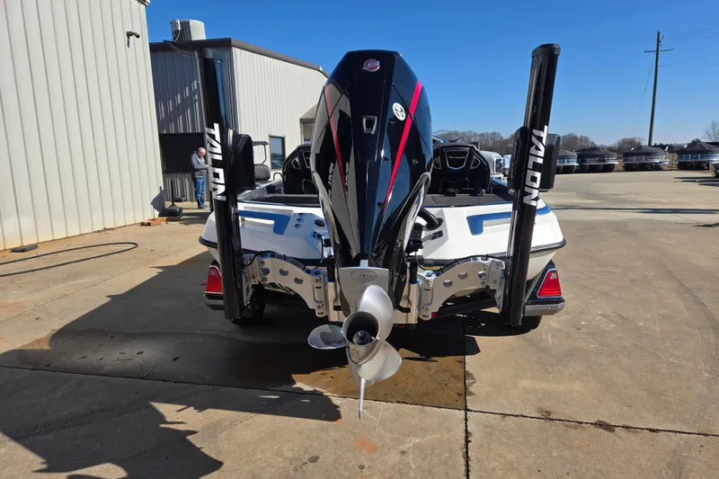 Slide: The Image of 2022 Ranger Z520R boat with Talon anchors, rear view in a sunny outdoor setting. - 4