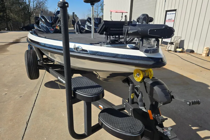 Slide: The Image of 2022 Ranger Z520R boat on trailer with steps, parked outdoors. - 9