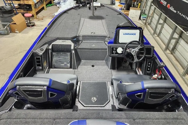 Slide: The Image of 2026 Ranger Z521R Cup-Equipped boat interior with Lowrance electronics and dual seats. - 5
