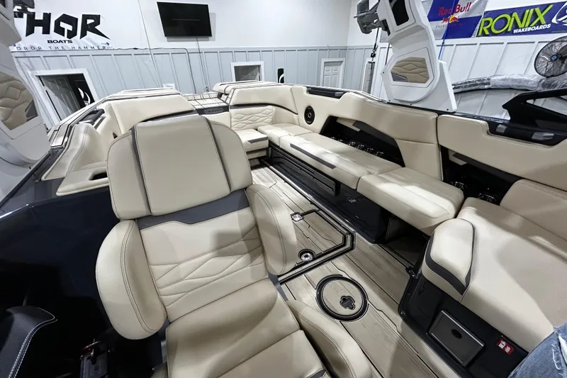 Slide: The Image of Luxurious interior of 2026 Supra SE boat with beige leather seating and modern design. - 6