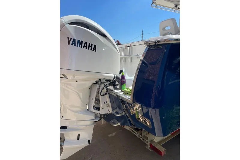 Slide: The Image of 2005 Southport 28 Center Console with Yamaha outboard engine, on a trailer. - 23