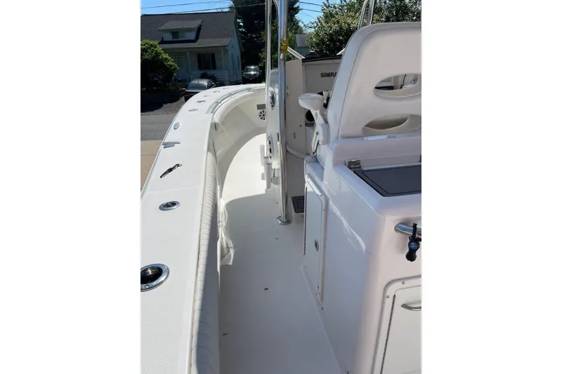 Slide: The Image of 2005 Southport 28 Center Console boat interior with seating and console view. - 31