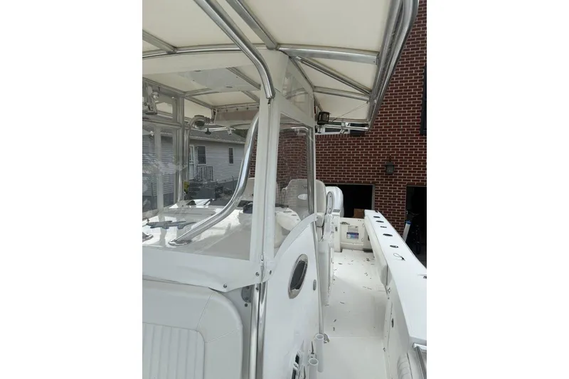 Slide: The Image of 2005 Southport 28 Center Console boat with sleek design and spacious deck. - 36