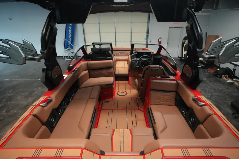 Slide: The Image of 2026 Supra SA boat interior with luxurious tan seating and modern design features. - 12