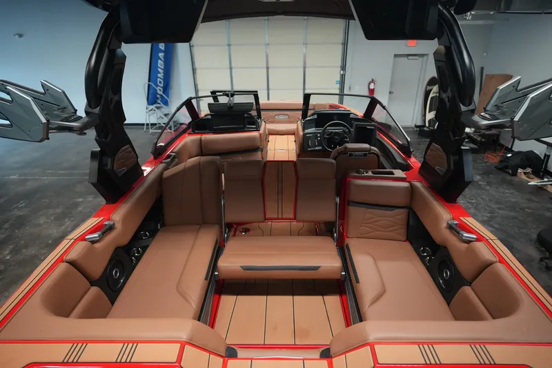 Slide: The Image of 2026 Supra SA boat interior with luxurious seating and advanced dashboard features. - 13