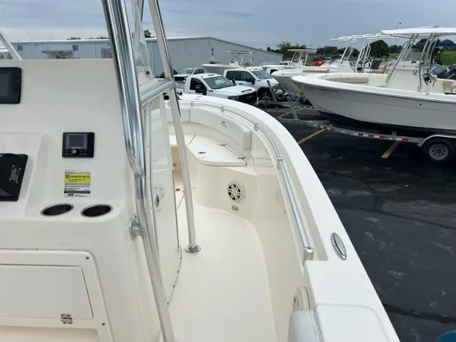 Slide: The Image of Cobia 237 Center Console boat, 2020 model, parked in a lot. - 8