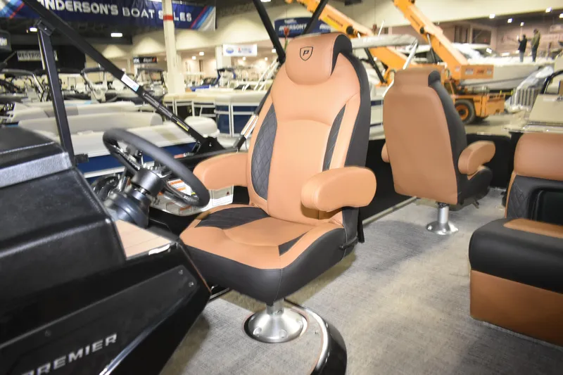 Slide: The Image of 2026 Premier 230 Angler 2 Point boat interior with luxurious seating and modern steering wheel. - 3