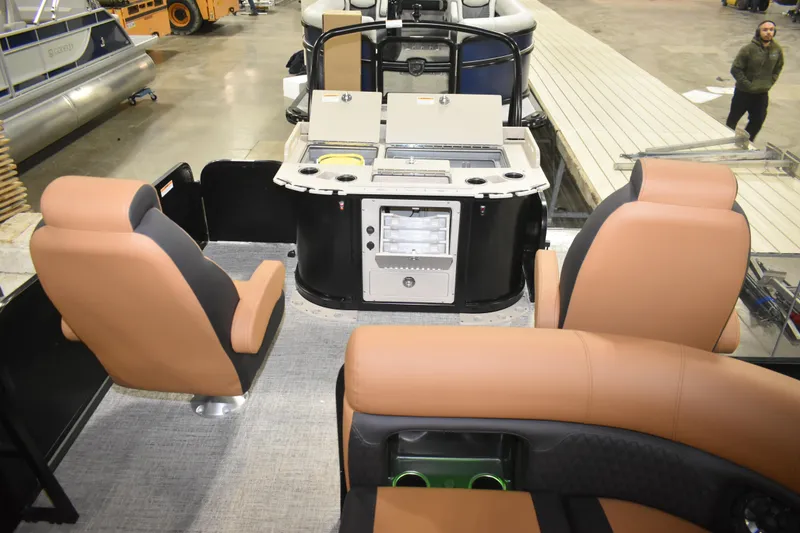 Slide: The Image of Interior of 2026 Premier 230 Angler 2 Point boat with seating and amenities. - 5