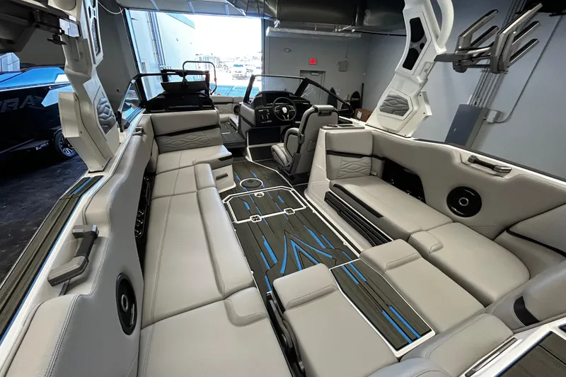 Slide: The Image of 2025 Supra SL boat interior with luxurious seating and modern design. - 6