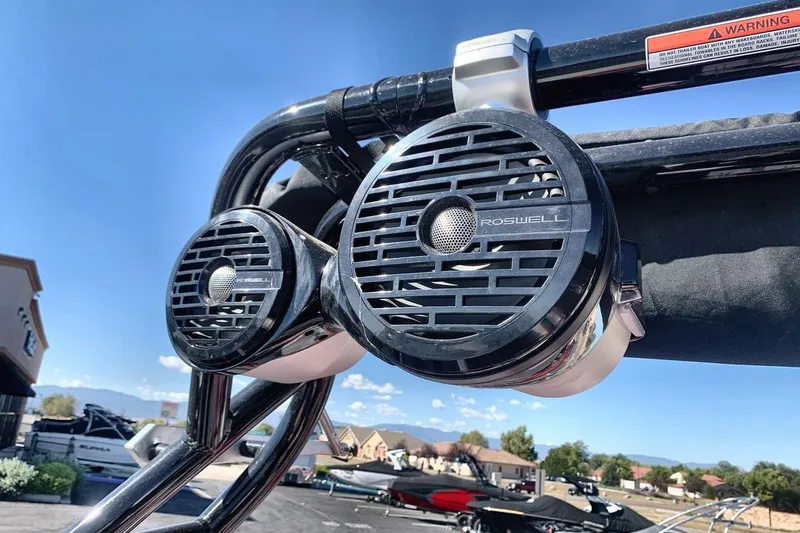 Slide: The Image of 2023 Moomba Mojo boat with Roswell speakers mounted on a metal frame. - 21