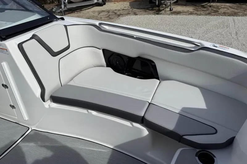 Slide: The Image of 2026 Yamaha Boats AR250 interior seating with sleek, modern design and comfortable upholstery. - 13