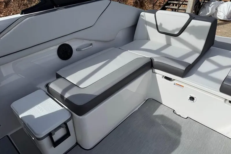 Slide: The Image of 2026 Yamaha Boats AR250 interior seating with sleek, modern design and comfortable upholstery. - 15