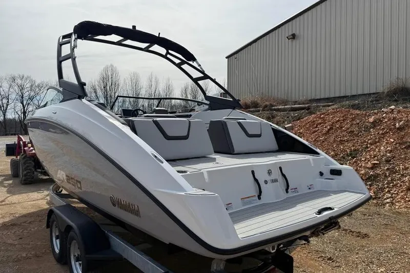 Slide: The Image of 2026 Yamaha Boats AR250 on trailer, sleek design, outdoor setting. - 6