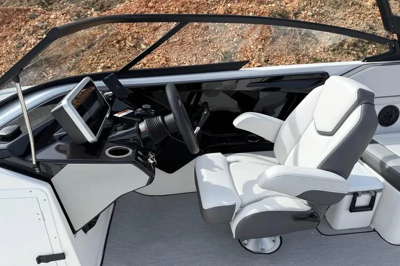 Slide: The Image of 2026 Yamaha Boats AR250 cockpit with modern steering and comfortable seating. - 8