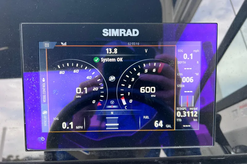 Slide: The Image of Simrad display on 2020 Sea Ray SDX 270 Outboard showing system status and metrics. - 14