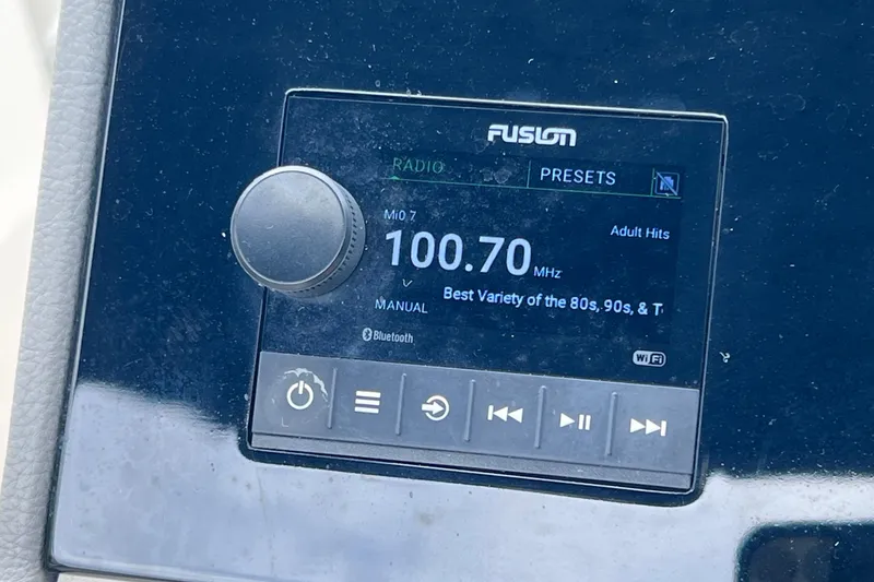 Slide: The Image of Fusion radio display on 2020 Sea Ray SDX 270 Outboard, tuned to 100.70 MHz. - 15